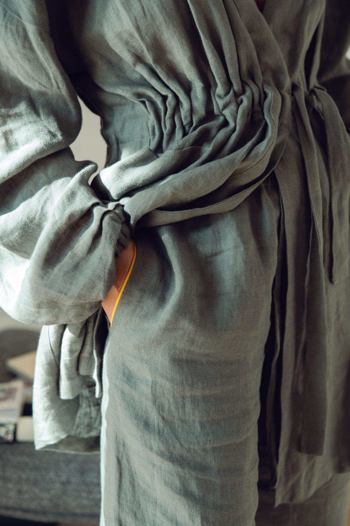 Women's short linen robe in grey.