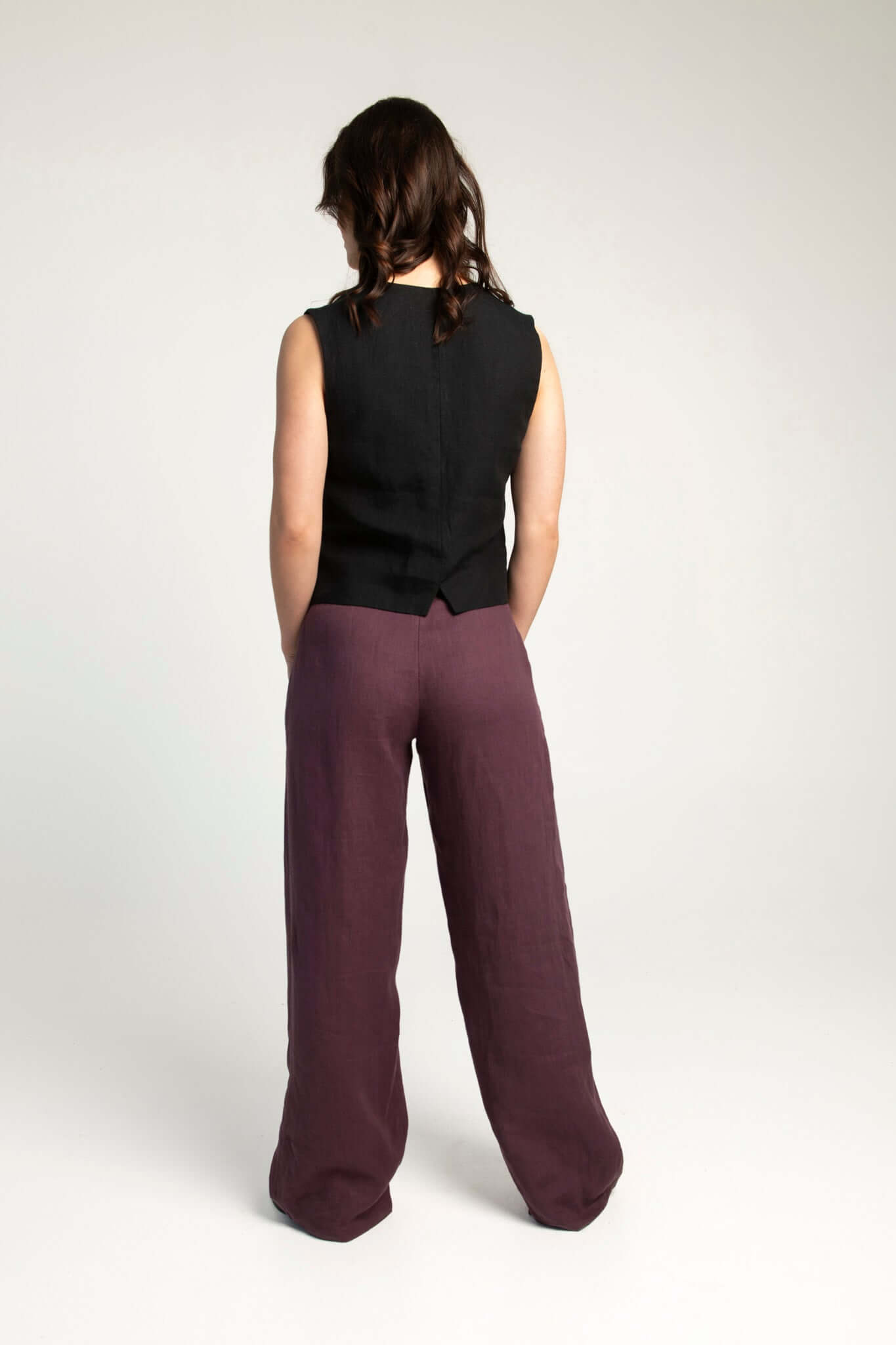 Sleeveless black linen waistcoat Vesta, back view