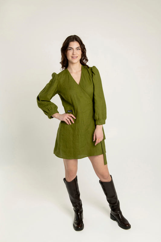 Madeleine crossover linen mini dress in olive green with adjustable waist, two side pockets.