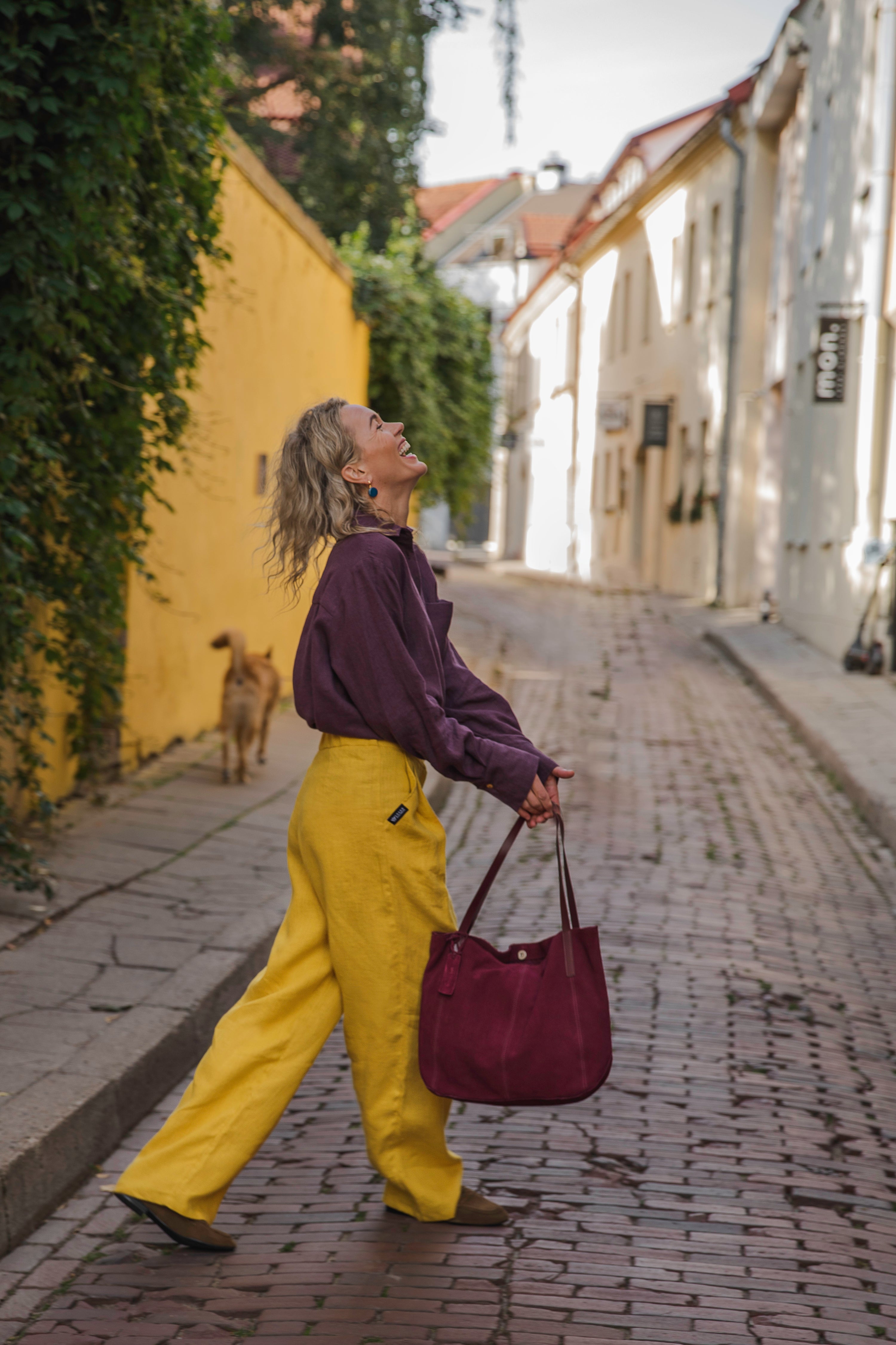 Women’s autumn linen outfit: oversized long-sleeve plum linen shirt Brillante with side pockets paired with mustard yellow linen pants Indepence II