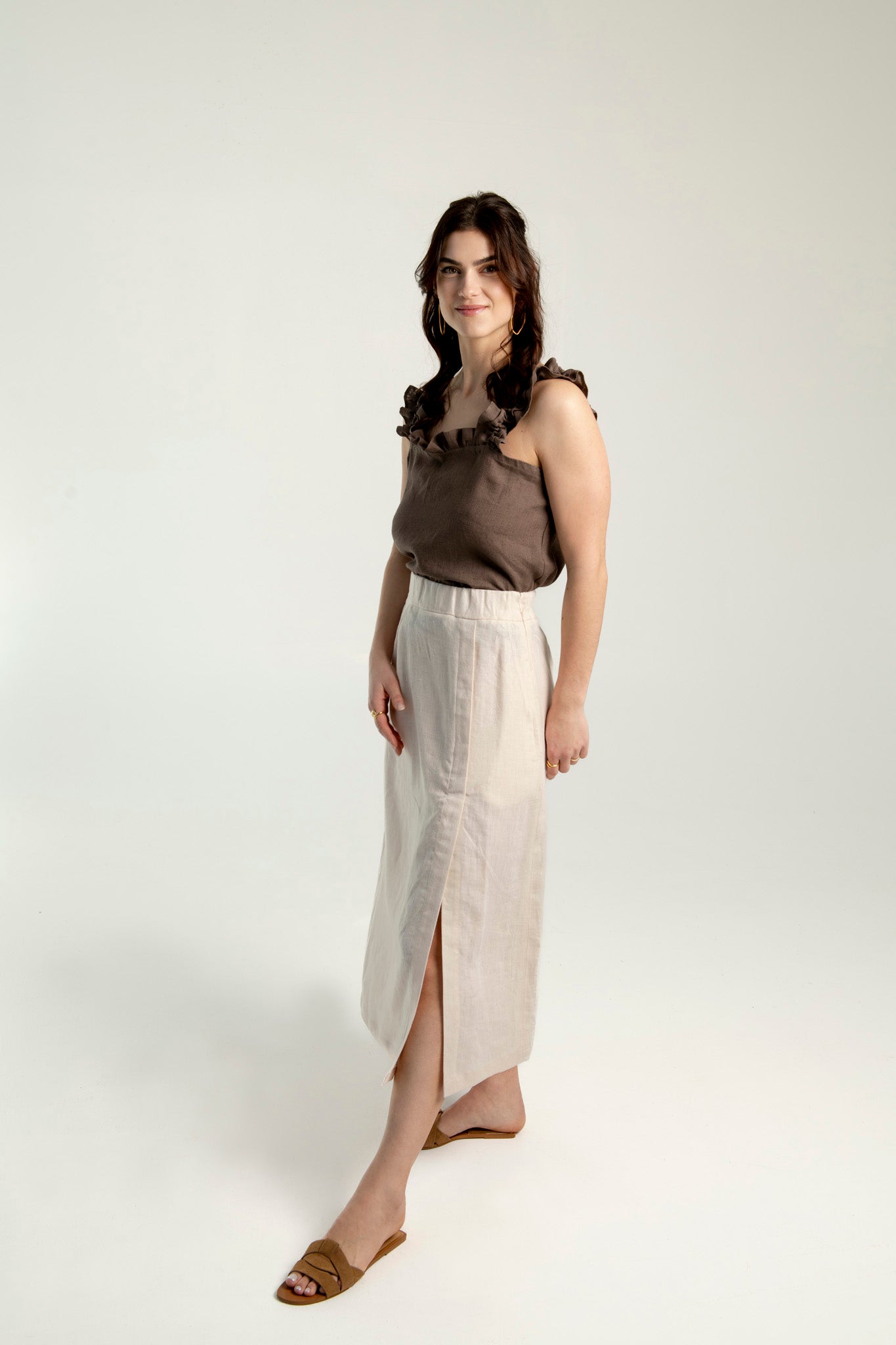 Women’s linen midi skirt with front slit, breathable natural fabric, A-line summer skirt for elegant outfits.